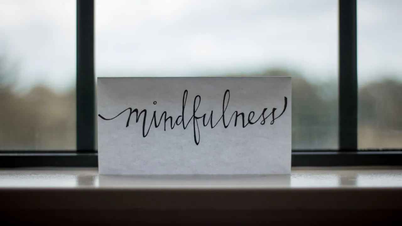 A handwritten 'mindfulness' card on a windowsill — the kind of pause this honest safety take asks for