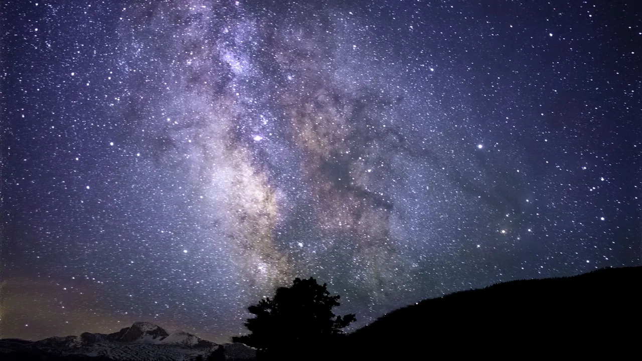 The Milky Way stretched across a deep night sky — the 3 AM mood of finding someone else awake on the other side of the world